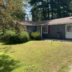 Front yard of house for sale near Mullet Lake