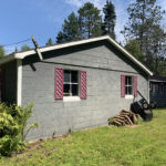 Back of garage of house for sale near Mullet Lake